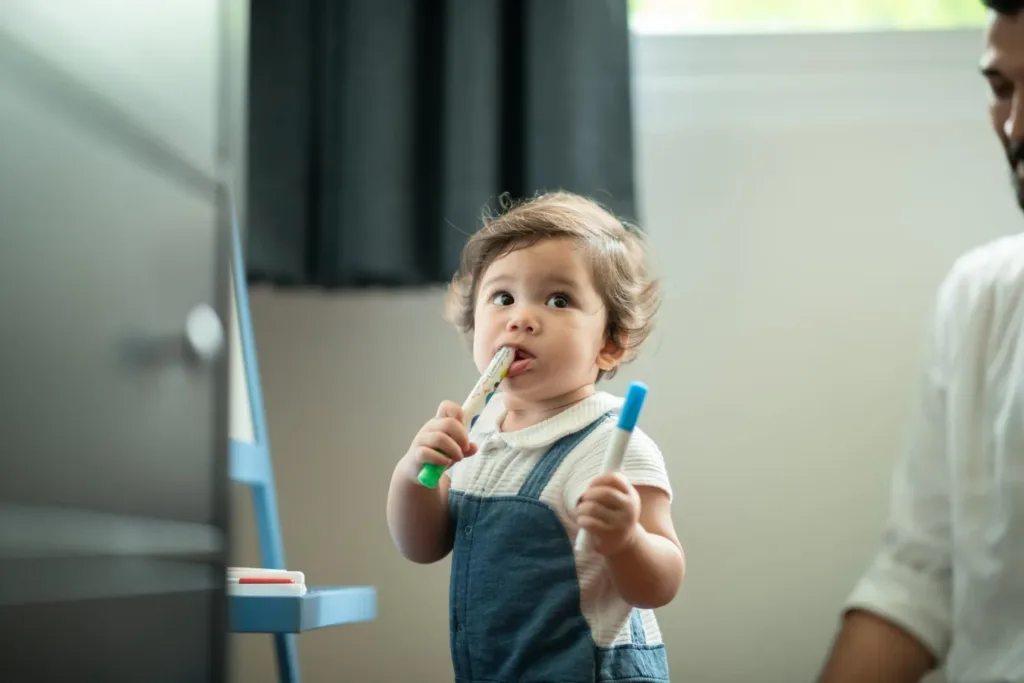 brushing infants teeth